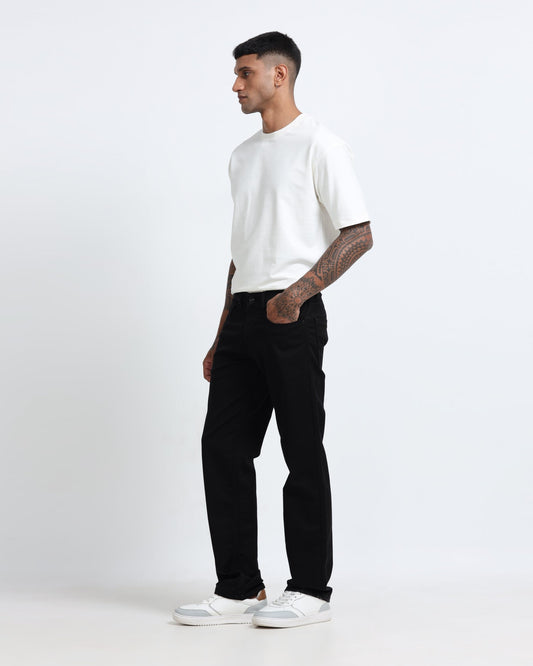 Men wearing straight fit jeans and black cargos from Rockstar Jeans denim collection showcasing 2026 fashion trends