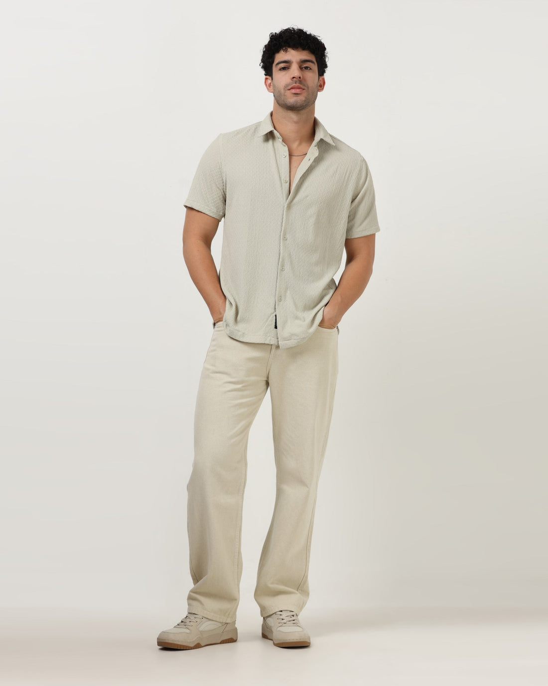 sage-green-shirt-with-black-jeans-rockstar-jeans.