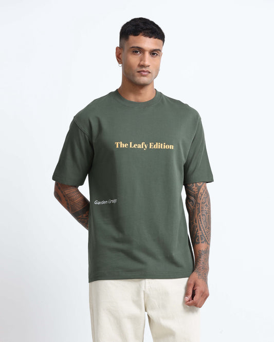 WELLNESS IN BLOOM FOREST GREEN TEE - Oversized fit