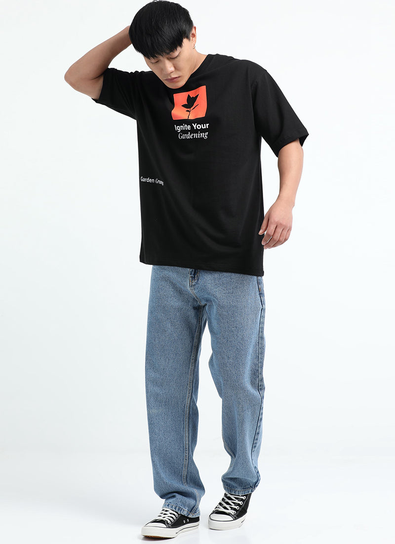 IGNITE YOUR GARDENING Oversized Cotton Printed T-Shirt Midnight Black - Model Full View