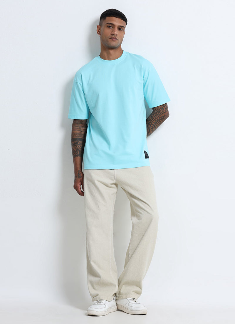 SIGNATURE Oversized Solid Cotton T-Shirt Crystal Blue - Model view