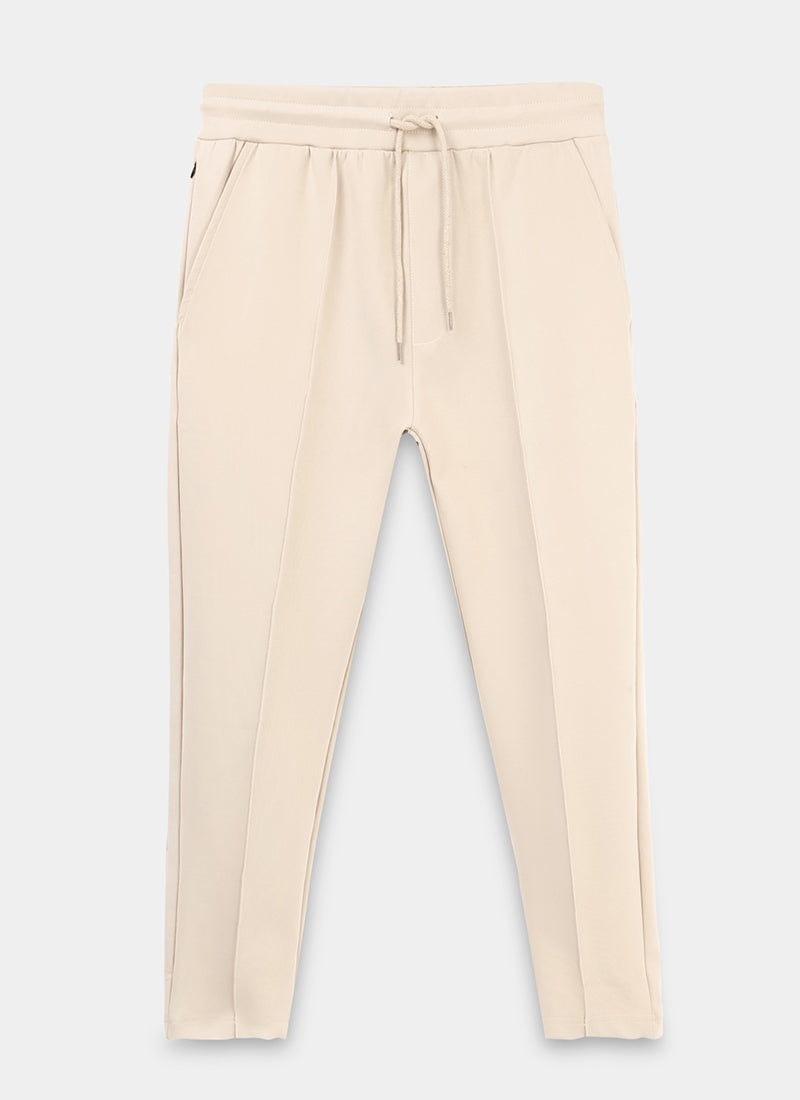 SUPER STRETCH Relaxed Fit Elastic Waistband With Drawstring Trousers Ecru Ivory-Flatlay Front View