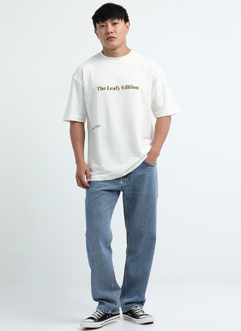 WELLNESS IN BLOOM Oversized Cotton Printed T-Shirt Off White - Matching Jeans View