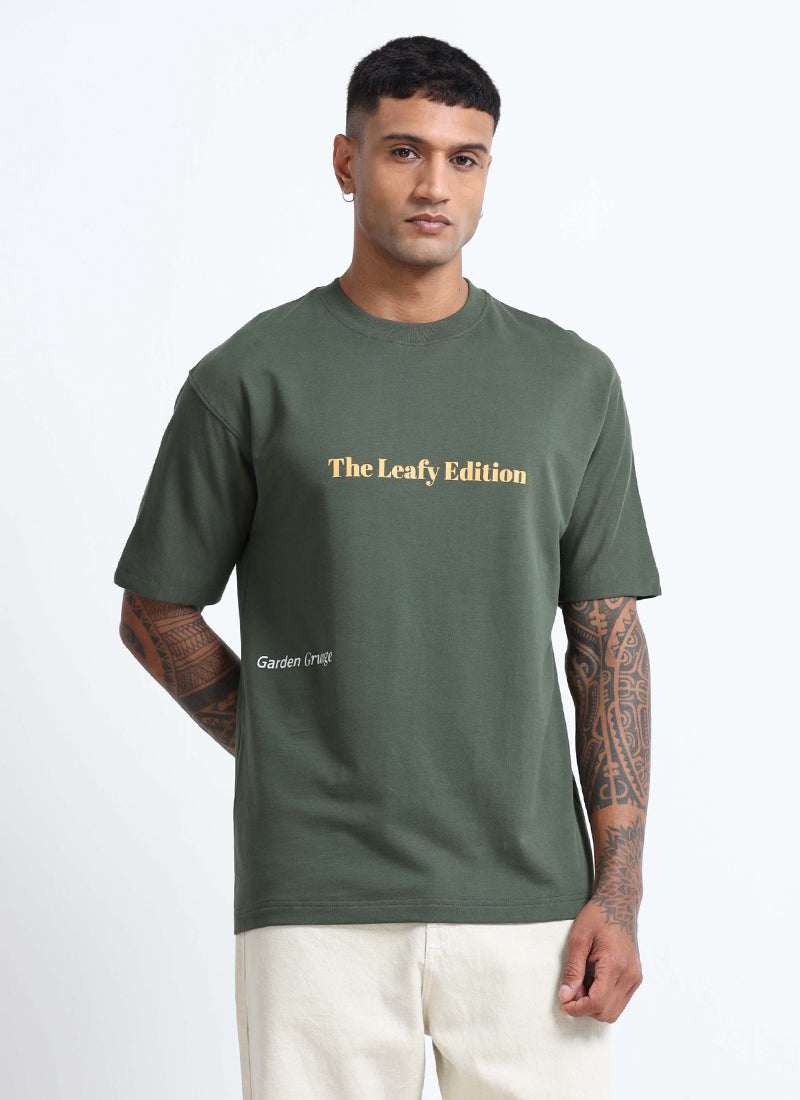 WELLNESS IN BLOOM Oversized Cotton Printed T-Shirt Woodland Green - Front Image