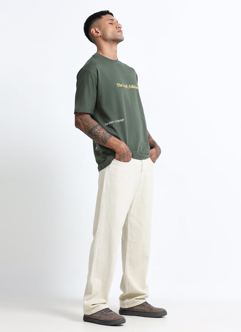 WELLNESS IN BLOOM Oversized Cotton Printed T-Shirt Woodland Green - Flatay Back View - Matching Jeans